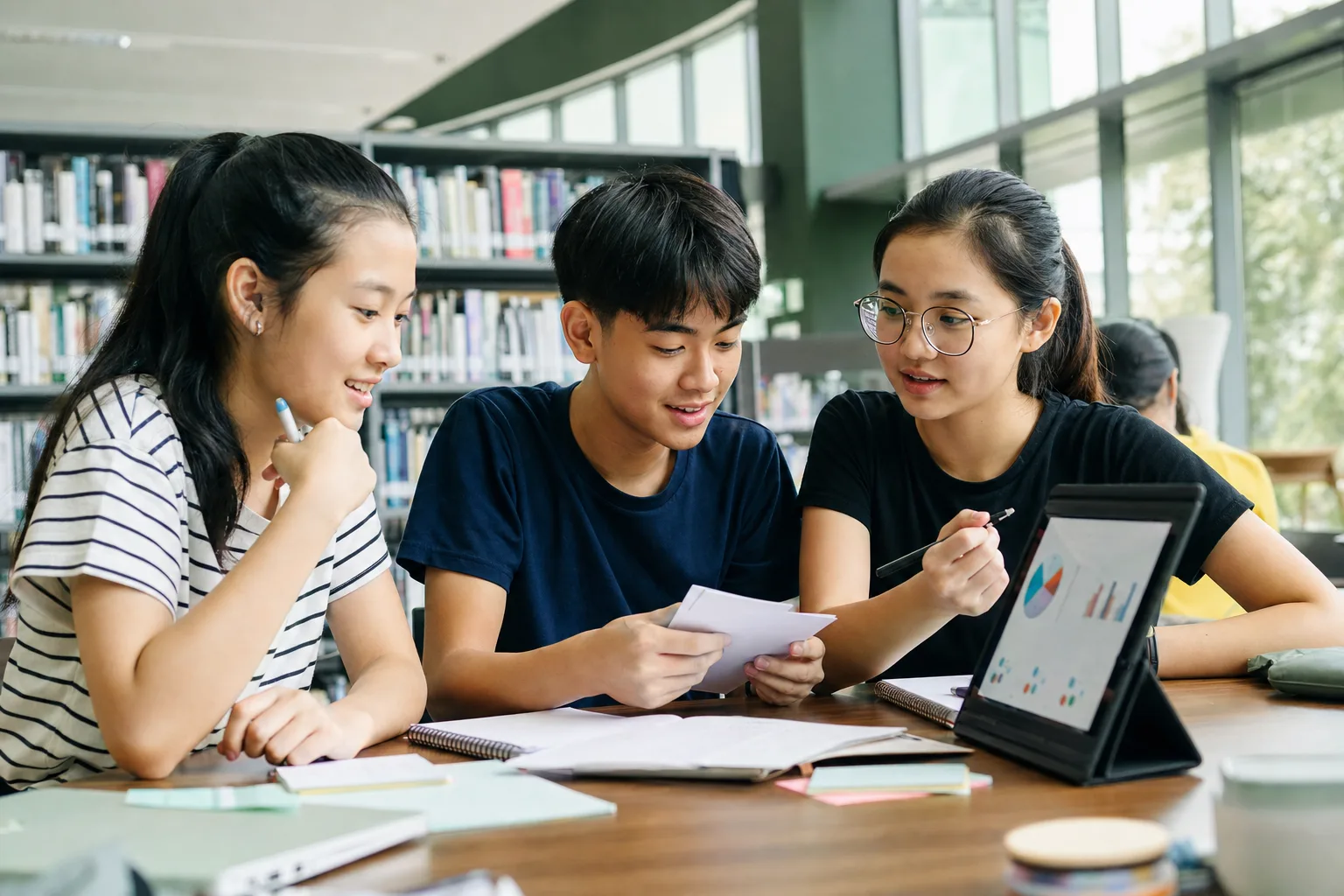 A group of secondary-age students studying together